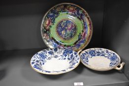 Two Charlotte Rhead for Bursley Ware pottery floral carnation pattern bowls, decorated in shallow