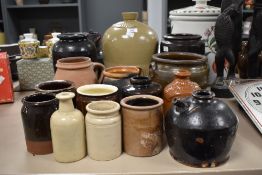 A large stoneware flagon having impressed marks for 'J. Atkinson, Windermere', h30cm, sold