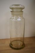 A large clear glass confectionery jar and cover (some chipping) 43cm