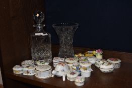 A selection of twenty one bone china florally decorated trinket boxes, sold along with a cut crystal