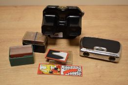 A vintage Sawyer's view-master sold together with two boxes of Japanese Hanafuda playing cards and a
