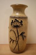 A large West German ceramic vase having floral pattern on a glaze ground, model 239-41, h41cm