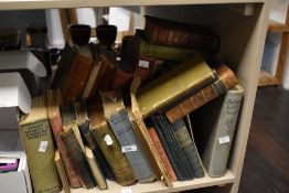 An assortment of mixed books comprising titles 'Gone With The Wind' by Margaret Mitchell, 'Below The