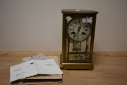 An early 20th century French Medaille D'or Paris eight day clock with compensated mercury filled