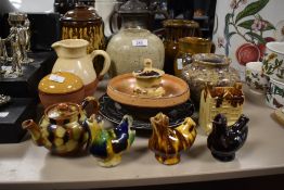 A varied selection of studio pottery items including three vintage pottery bird whistles and various