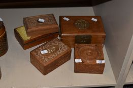A group of carved wood jewellery boxes, ( 5 ).