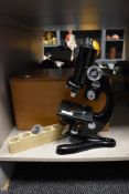 A Beck of London Medical Biological Microscope with box, having adjustable lens and impressed makers