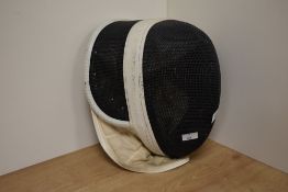 A vintage Leon Paul fencing mask.
