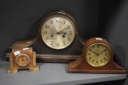 A large 20th century Napoleon hat mantel clock, L55cm, sold together with a smaller Napoleonic style