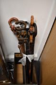 A hard wood walking stick with carved elephant handle, H93cm, sold together with various other