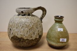 A West German fat lava vase having single handle and impressed makers marks to base, pattern 484-21,