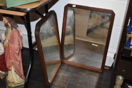 Two vintage mirrors both having distressed glass set within a stained pitch pine frame, largest