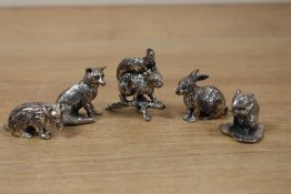 A small cast white metal squirrel perched on a branch, H4cm, sold together with a mouse, fox, hare