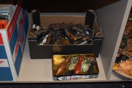 A box of vintage toilet pulls, sold together with various bottle openers, iron keys, brass bells
