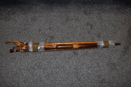 Five vintage walk sticks/canes, one in the form of a snakes head.