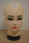 A plastic female bust shop display mannequin, h28