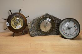 A partially turned and polished serpentine mantel barometer 15cm sold along with a decorative