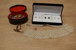 Three pairs of cultured pearl stud earrings, of white, black and peach lustre, along with a small