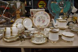 A Paragon Fine Bone China tea service having gold colour foliage patterns on a white ground, sold