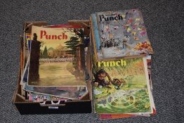 An assortment of vintage magazines and comics including titles of Punch 'Summer Special', 'Richard