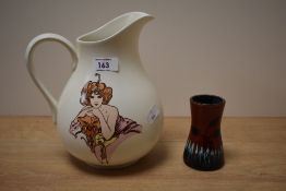 A Poole Fleurie pattern pottery pitcher, decorated with an image of a woman in the Art Nouveau