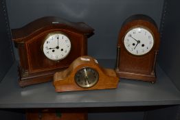 An Edwardian mahogany Quartz mantel clock having white enamel dial and part brass columns, H26cm x