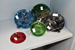 A set of 5 glass plaques having impressed decoration, subject matters include animals and foliage,