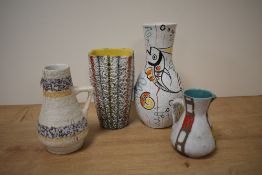 A mid-century Italian ceramic vase of baluster form, decorated with colourful tropical fish on a