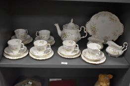A Royal Albert bone china 'Haworth' pattern teaset for six, comprising six trio's, teapot, sugar