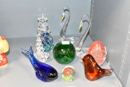 A green glass paperweight in sphere form having several trapped air bubbles, h8cm, sold together