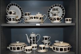 A large Midwinter dinner service decorated with Op-art pattern of circles within squares of grey and