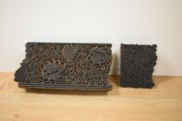 An early 20th century wooden printing block hand carved with floral patterns, L27cm, sold together