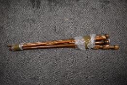 A hard wood walking stick decorated with carved Africa figure, h103cm, sold together with various