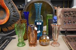 A mid-century amethyst purple glass vase measuring 18cm sold alongside a selection of other mid-