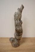 An unusual anthropomorphic wooden sculpture in the form of a tree branch, heavily burnished,