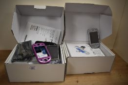 Two 02 XDA II mobile phones, one in dismantled state, both with boxes and manuals etc.