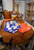 A collection of olympic memorabilia, to include a 1926 scarf, collection of Moscow 1980 badges,