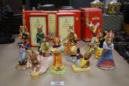 A collection of thirteen Royal Doulton Bone China Bunnykins series figures, characters include The