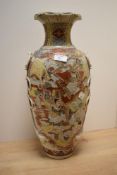 A 20th century Japanese Satsuma pottery vase of traditional design with figures and tied rope ornam
