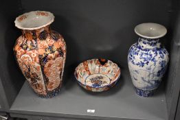 A 19th century Japanese Imari pattern vase of baluster form, decorated in foliage, gilt and burnt