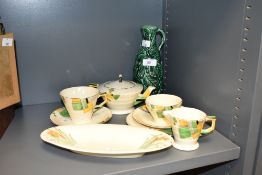 A Clarice Cliff Newport Pottery oval corn on the cob dish 25cm (hairline to rim) sold along with