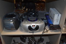 A Beautronics compact disc CD player and radio sold alongside a similar Phillips AZ1007 CD radio