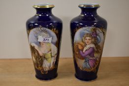 A pair of Royal Bonn German porcelain vases, hand painted with scenes of lovers heavily applied with
