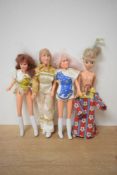 Four 1980's Model Toys Limited and Hasbro (Hong Kong) Dolls, all fully dressed and wearing boots