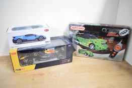 Three Radio Contolled Cars, Rastar 1:18 scale Oracle Red Bull Racing, CMJ 1:24 scale Bugatti Divo