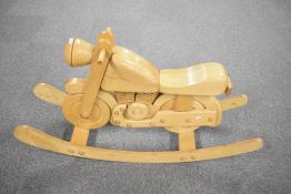 A modern wooden Rocking Motorbike on traditional rocker base, length 130cm, height 70cm