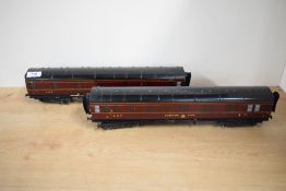 Two Bassett-Lowke 0 Gauge LMS Sleeping Cars in traditional burgundy livery