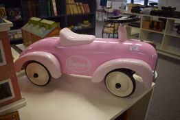 A Barbie Pink Baghera Ride On model Car, length 74cm, height 35cm