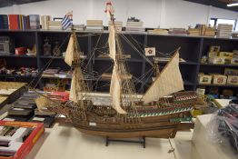 A hand made wooden model of a Galleon, Golden Hind, 100cm x 80cm, on wooden stand