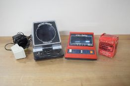 Two 1978 Mini Arcade Games, Grandstand Astro Wars and Tomy Astroblaster, both battery operated and